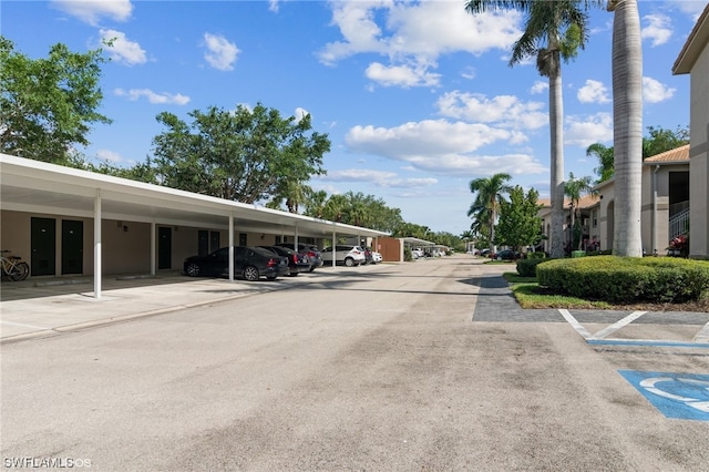 view of parking featuring a carport