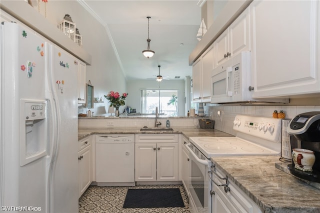 kitchen featuring white appliances, white cabinets, ceiling fan, and sink