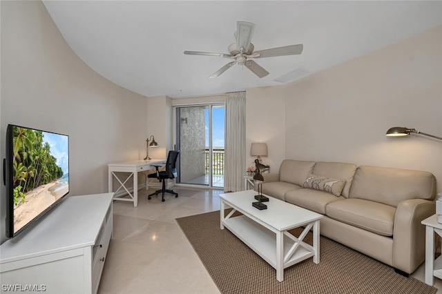 living room with ceiling fan