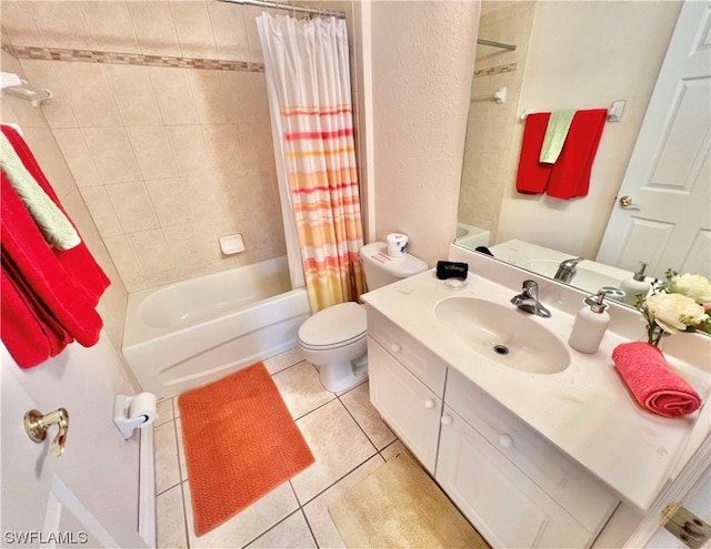 full bathroom with shower / bath combo with shower curtain, toilet, large vanity, and tile floors