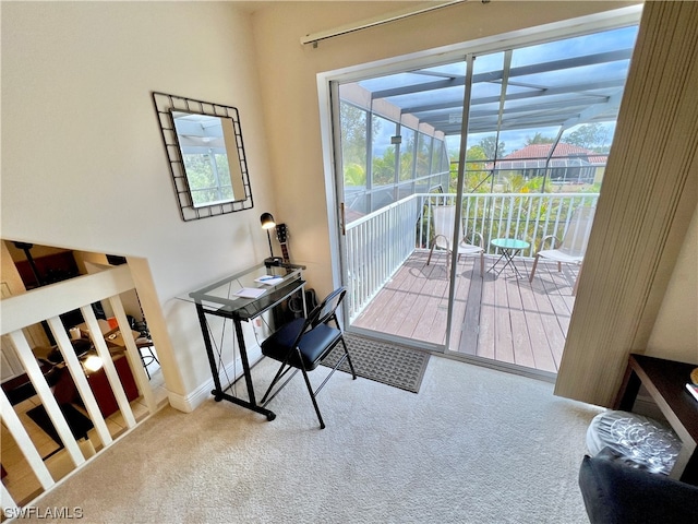 carpeted home office with a healthy amount of sunlight