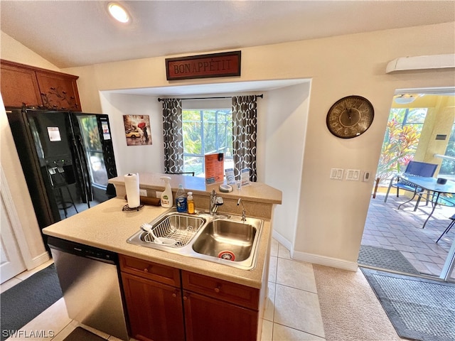 kitchen with light colored carpet, sink, black fridge with ice dispenser, dishwasher, and vaulted ceiling