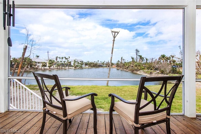 wooden terrace with a water view