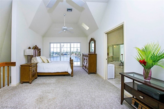 carpeted bedroom with connected bathroom, ceiling fan, high vaulted ceiling, and access to outside