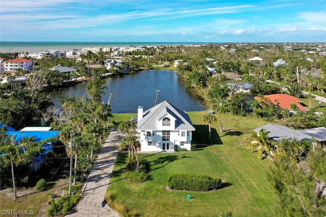 drone / aerial view with a water view