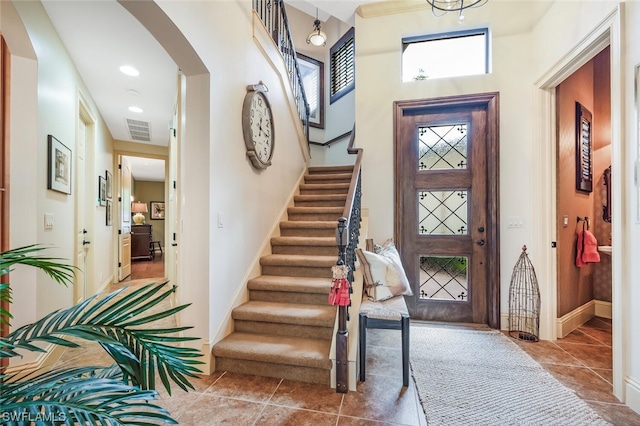 entrance foyer with light tile patterned flooring