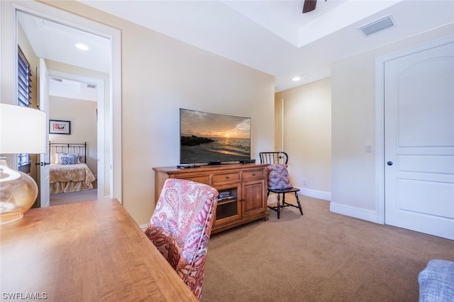 office area with ceiling fan and carpet