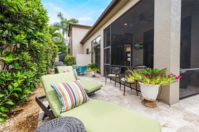 view of patio / terrace with ceiling fan