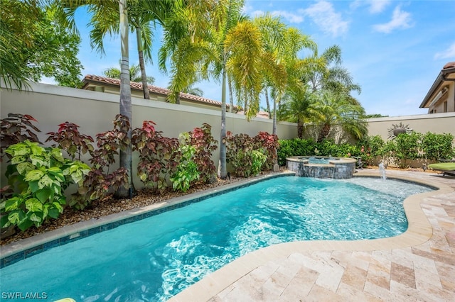 view of swimming pool featuring an in ground hot tub and pool water feature