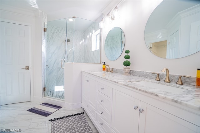 bathroom with double sink, crown molding, a shower with shower door, tile flooring, and large vanity