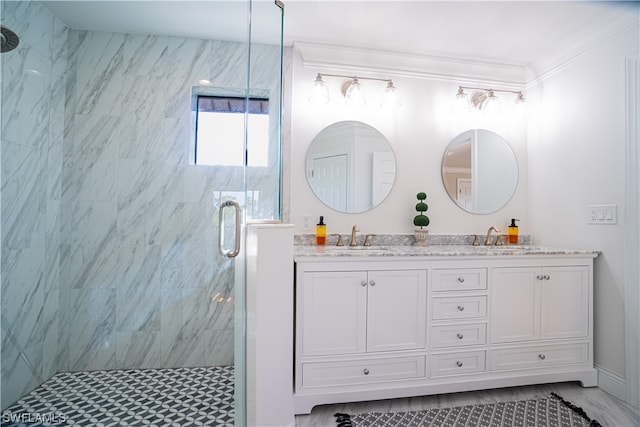 bathroom with an enclosed shower, double sink, tile flooring, large vanity, and ornamental molding