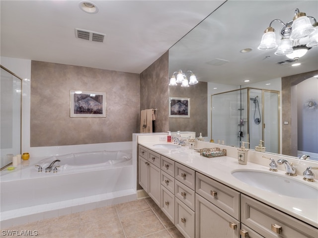 bathroom with vanity, shower with separate bathtub, and tile patterned flooring