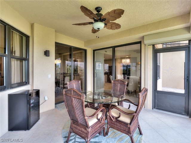 sunroom / solarium with ceiling fan