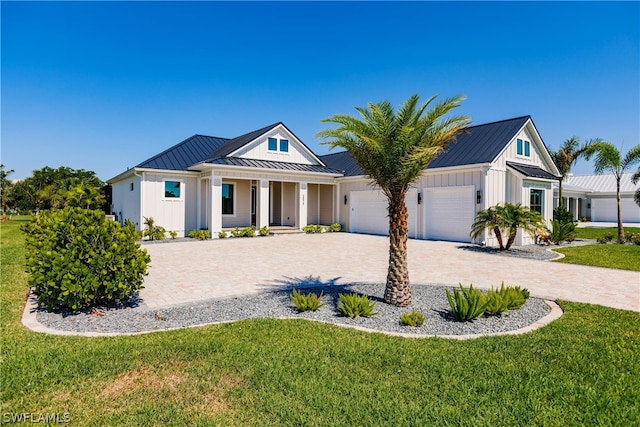 modern farmhouse featuring a front yard