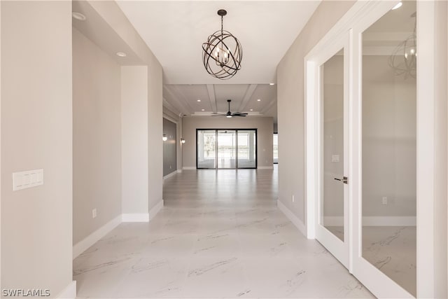 hall featuring an inviting chandelier, french doors, and light tile floors