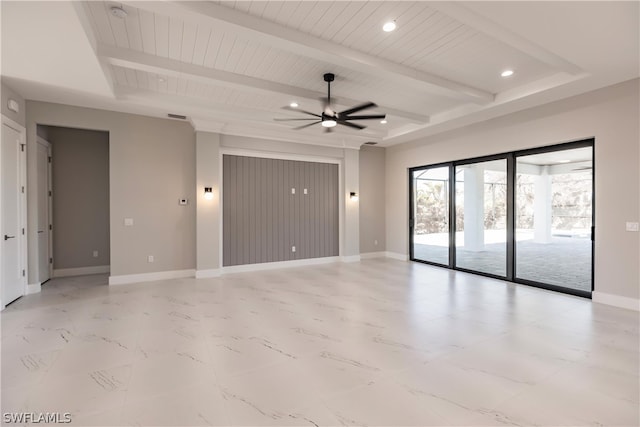 spare room with beamed ceiling, ceiling fan, and light tile floors