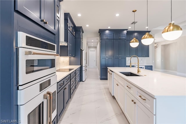 kitchen featuring double wall oven, backsplash, hanging light fixtures, sink, and white cabinetry