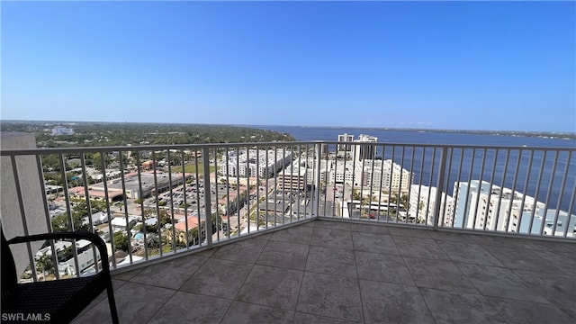 balcony featuring a water view