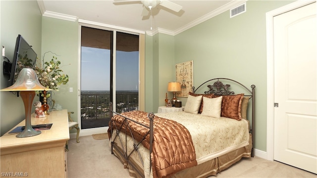 bedroom featuring light carpet, ornamental molding, expansive windows, and ceiling fan