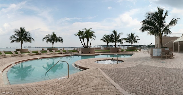 view of pool featuring a patio