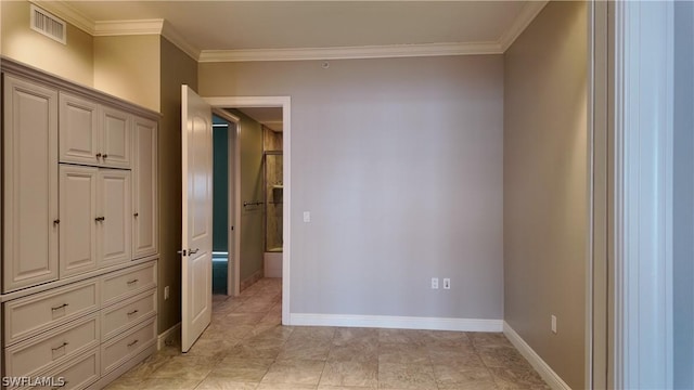 unfurnished bedroom featuring crown molding