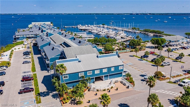 drone / aerial view with a water view