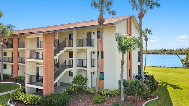 view of property with a water view