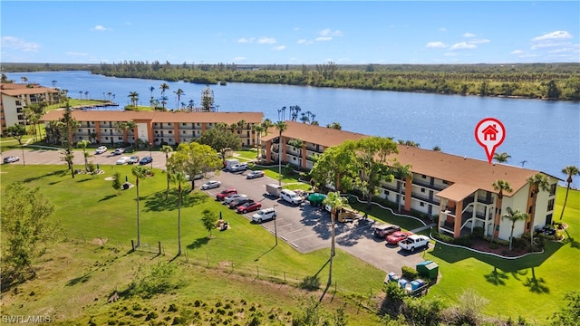 drone / aerial view with a water view