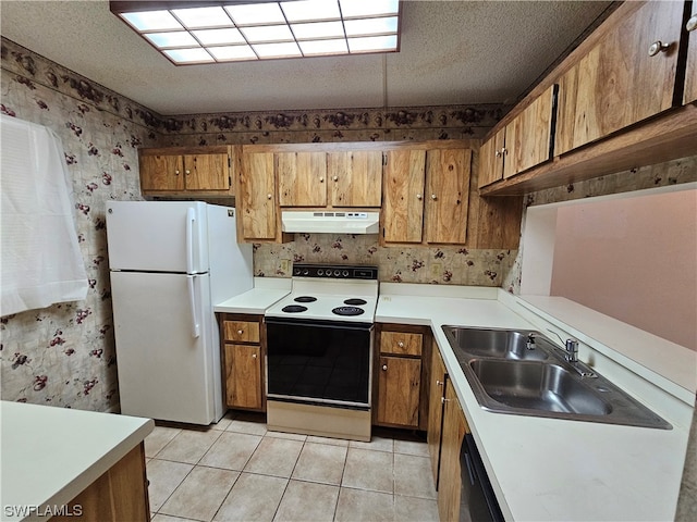 kitchen with white appliances, sink, a textured ceiling, and light tile floors