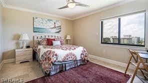 6672 Estero Blvd Unit A907, Fort Myers Beach, FL 33931 - bedroom with crown molding and ceiling fan