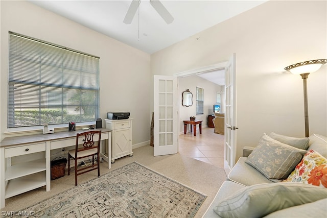 tiled home office with french doors and ceiling fan