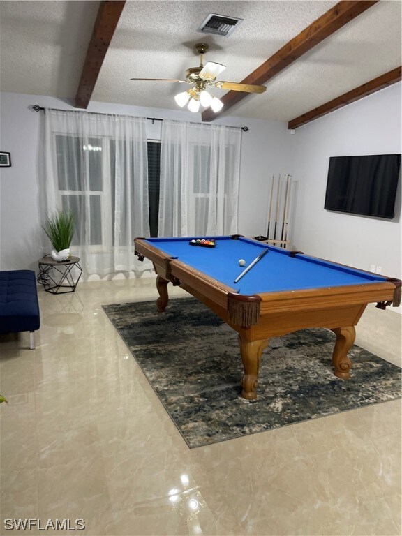 rec room featuring ceiling fan, a textured ceiling, and pool table