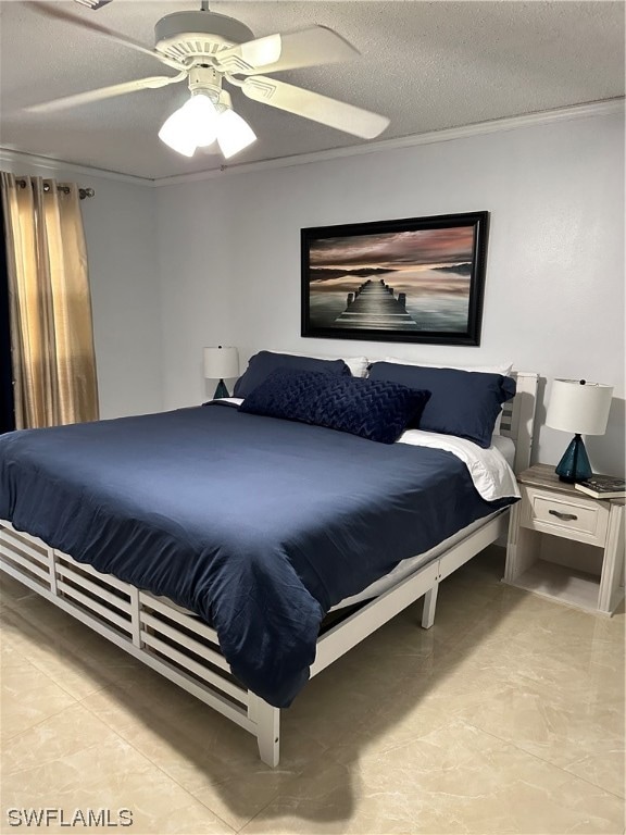 bedroom featuring a textured ceiling, ceiling fan, and ornamental molding