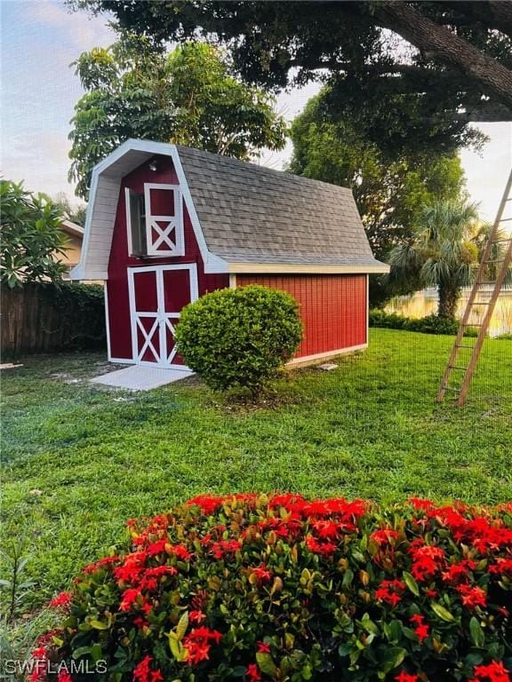 view of outdoor structure featuring a yard