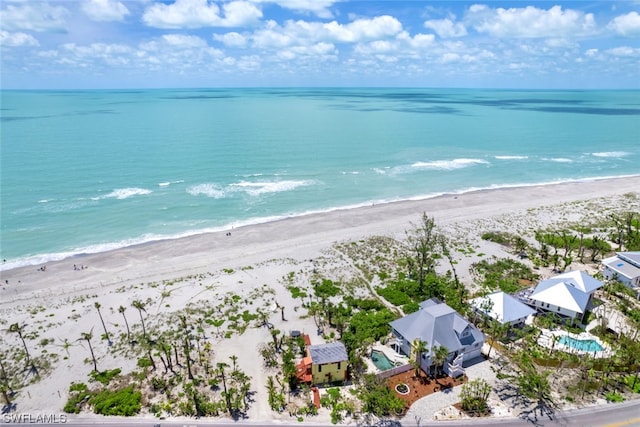 aerial view with a beach view and a water view