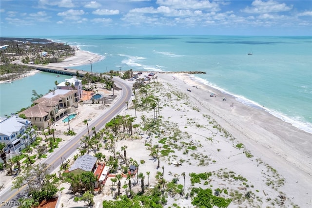 aerial view featuring a water view and a beach view