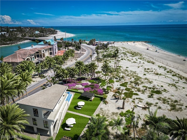 aerial view featuring a water view and a beach view