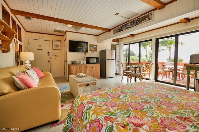 living room with wooden ceiling, light tile patterned flooring, and beam ceiling