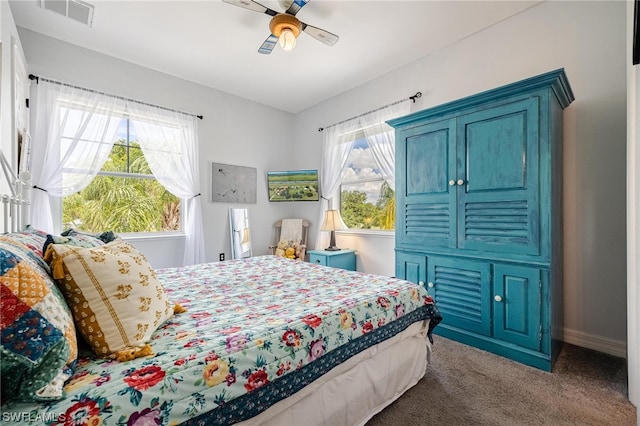 carpeted bedroom featuring ceiling fan