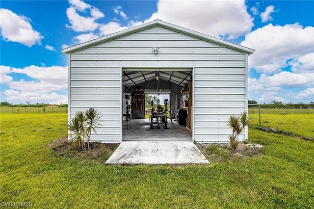 view of outdoor structure with a yard