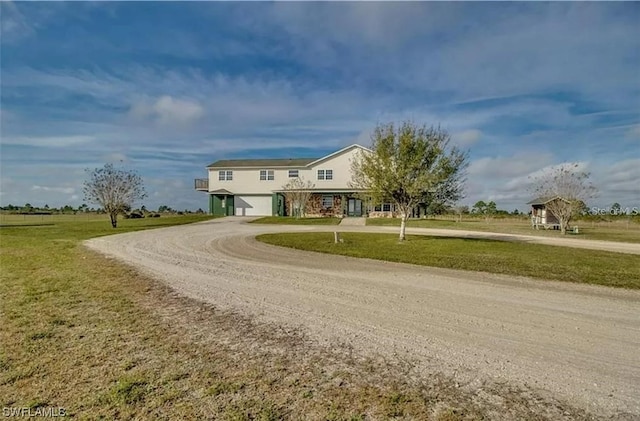 view of front of house featuring a front lawn