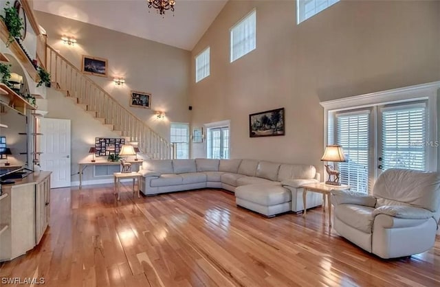 living room with plenty of natural light and light wood-type flooring