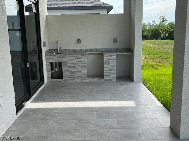 view of patio featuring sink