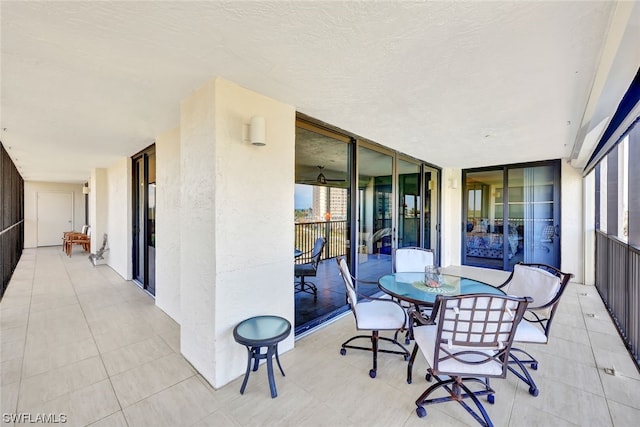 view of patio / terrace with a balcony