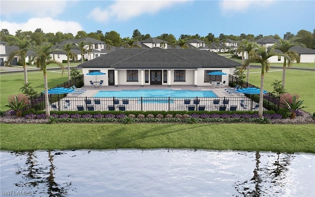 rear view of property featuring a community pool, a water view, a patio area, and a lawn