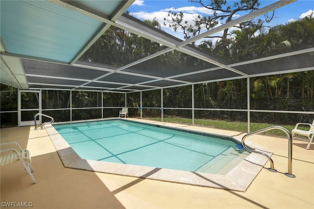 view of pool featuring a patio area and a lanai