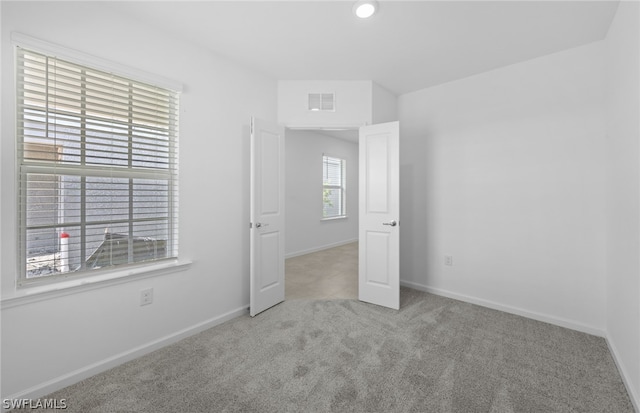 unfurnished bedroom with carpet