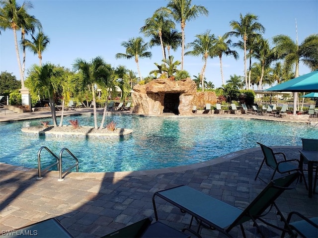 view of swimming pool with a patio area