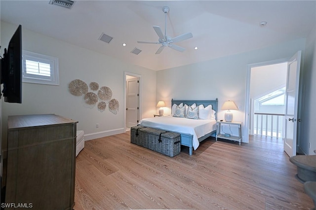 bedroom with ceiling fan and light wood-type flooring