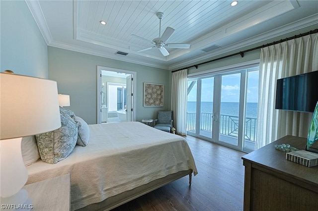 bedroom with wood-type flooring, ornamental molding, french doors, access to outside, and a raised ceiling